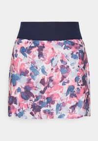 Blommig kjol med marinblå midja. Har rosa, blå och vita abstrakta mönster på lätt tyg. A-linjeformad, med längd till mitten av låret.