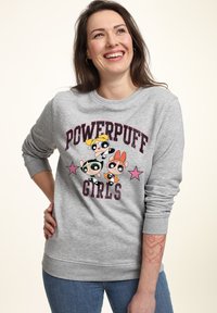 Felpa grigia con grafica delle "Powerpuff Girls", personaggi colorati e stelle rosa. Tessuto morbido con scollatura arrotondata e maniche lunghe.