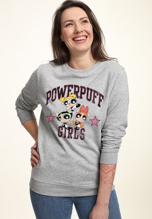 Felpa grigia con grafica delle "Powerpuff Girls", personaggi colorati e stelle rosa. Tessuto morbido con scollatura arrotondata e maniche lunghe.