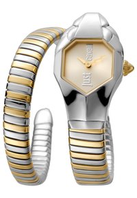 Ura s srebrom in zlatom z oktagonalnim okvirjem, bež številčnico in zapestnico v stilu manšetne, ki vsebuje izmenične teksturirane povezave.