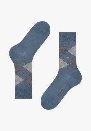 Calcetines azules con un patrón argyle de diamantes en tonos gris y rojo. Fabricados con un material suave y con un puño acanalado.