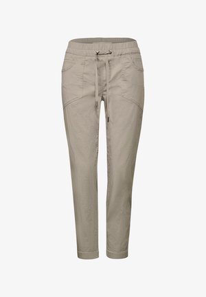 Pantalons de jogging beiges avec une taille élastique et un cordon de serrage, comportant deux poches latérales et un design de jambe fuselée. Tissu lisse et léger.