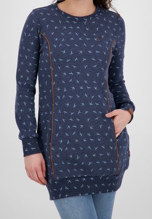 Abito felpa blu navy con stampa di uccelli, dotato di dettagli in piping marrone, maniche lunghe e una tasca frontale. Tessuto morbido.