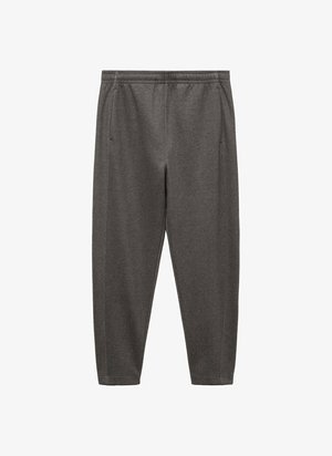 Grijze joggings met een zachte stof, voorzien van een elastische tailleband, zijzakken en een taps toelopend ontwerp.