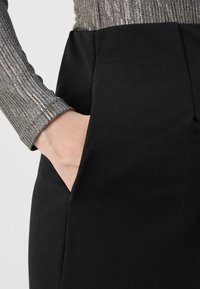 Vero Moda Maternity VMMBECKY SUPER WIDE PANTS - Kelnės - black