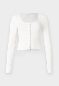 Άσπρη ριμπ μακρυμάνικη κομμένη ζακέτα με στρογγυλή λαιμόκοψη και οκτώ κουμπιά με πατιλέτα στο μπροστινό μέρος, τοποθετημένη επίπεδα σε φωτεινό φόντο.