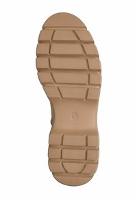 Semelle en caoutchouc beige avec une surface texturée, présentant des motifs de grip horizontaux et verticaux. Taille indiquée comme 37.