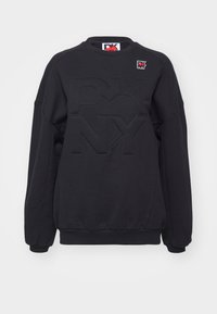 Felpa nera con scollatura rotonda. Presenta un logo "DKNY" in rilievo al centro e un piccolo patch del logo sul lato sinistro superiore. Miscela di cotone.