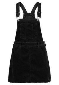 Svart kordflöjelsoverallklänning med justerbara band, framficka och sidoknappar som accent. Har en lätt fransad fåll.