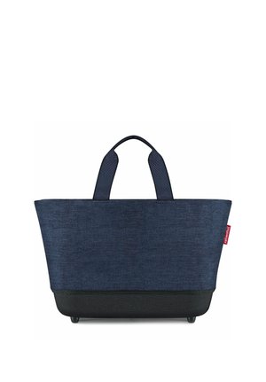 Borsa a tracolla blu navy con base nera, due manici corti e una piccola targhetta rossa del marchio sul lato destro.