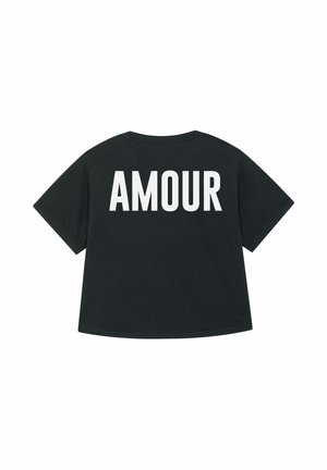 T-shirt nera oversize con la scritta "AMOUR" in grandi lettere bianche sul retro. Design semplice e casual con scollatura rotonda.