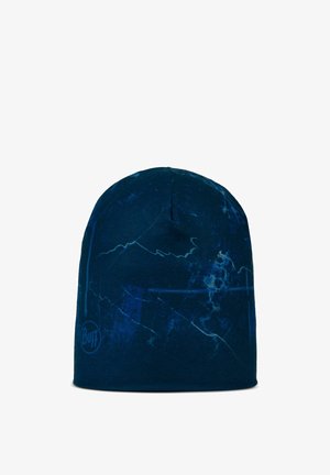 Blaues Beanie mit Marmor-Muster, aus dehnbarem Stoff. Verfügt über eine abgerundete Oberseite und ein kleines Logo auf der linken Unterseite.