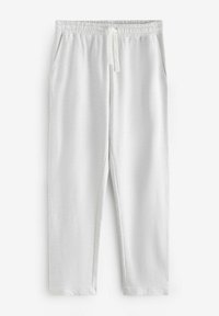 Pantaloni albi con croi conținut dintr-un material moale, având un tiv elastic cu sfori, buzunare laterale și o textură netedă.