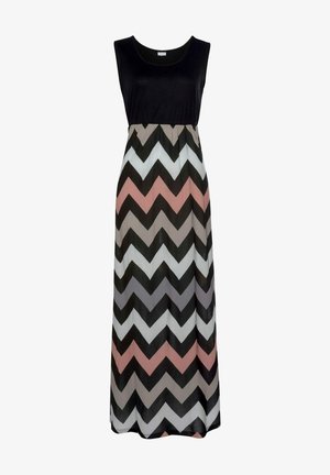 Maxi sukienka z jednolitym czarnym topem oraz wielokolorowym wzorem w zygzaki w odcieniach różu, szarości, bieli i czerni na spódnicy. Gładka faktura materiału.