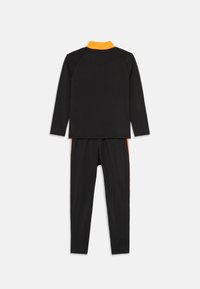 Puma INDIVIDUALLIGA UNISEX SET - Trenirka - black/heat fire