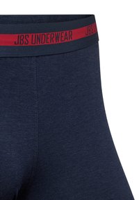 Boxer da uomo blu navy in un morbido tessuto elasticizzato. Presentano una cintura elastica rossa con la scritta 'JBS UNDERWEAR' stampata in nero.