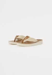 Flip-flops bejgi cu curea din material țesut bej și accent din piele maro. Prezintă o talpă albă cu detalii de cusătură pe margini.