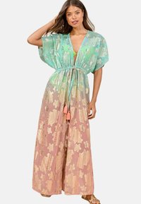 Sheer kimono-style cover-up in gradient teal and coral, featuring golden floral patterns and a drawstring waist with pink tassels.