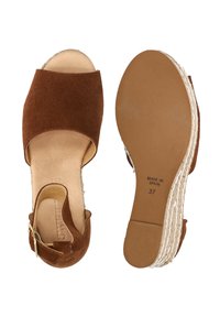 Brown suede espadrille sandals with an open toe, ankle strap, and woven jute sole. Size 37, labeled “Made in Spain” on the bottom.
