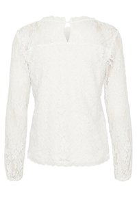 Blusa bianca in pizzo con maniche lunghe, motivo floreale testurizzato, apertura a chiave sul retro e orlo scallopato. Tessuto leggero e semi-trasparente.