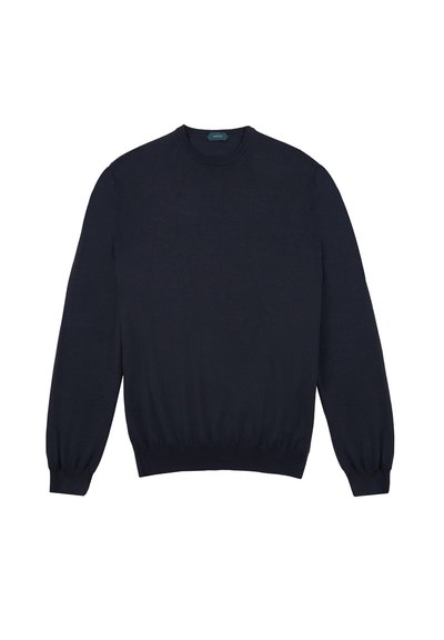 Pull bleu marine foncé à manches longues, col rond, avec des poignets et un ourlet côtelés. Texture lisse, design simple, sans motifs ni embellissements.