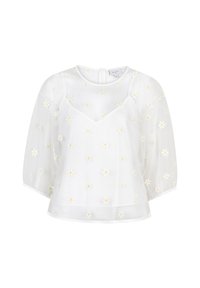 Weiße Bluse mit kurzen, puffigen Ärmeln, einem V-Ausschnitt und zarten gelben Gänseblümchen-Stickereien. Leichter, fließender Stoff.