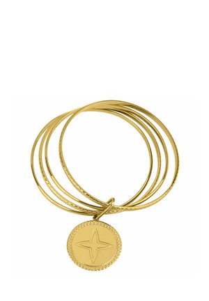 Gold bangle bracelet featuring multiple thin loops, textured accents, and a circular charm with a four-point star design.