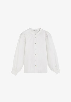 Blusa blanca hecha de una tela suave. Cuenta con mangas largas abullonadas, un cuello redondo y un frente con botones que se abotona, decorado con pequeños botones de color claro.