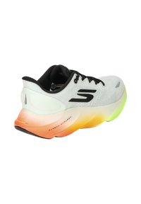 White running shoe with black accents, textured mesh upper, and a colorful gradient sole transitioning from orange to green. Features brand logo.