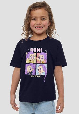 Navy blue t-shirt features a graphic design with four cartoon faces and the text "RUMI," depicting characters with purple hair and colorful outfits.