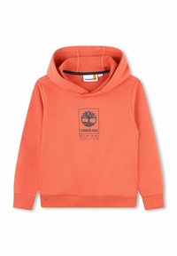 Hoodie corail orange avec une poche frontale, des poignets et un ourlet côtelés, et un graphique logo Timberland sur la poitrine. Tissu en mélange de coton doux.