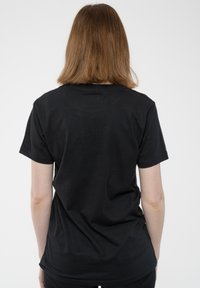 Paradiso Clothing KISS GUN STARS - Print T-shirt - black