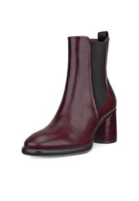 Burgundy läder ankelskänga med en kraftig klack, elastiska sidopaneler, slätt material och rund tå, med en dragflik för enkel påtagning.