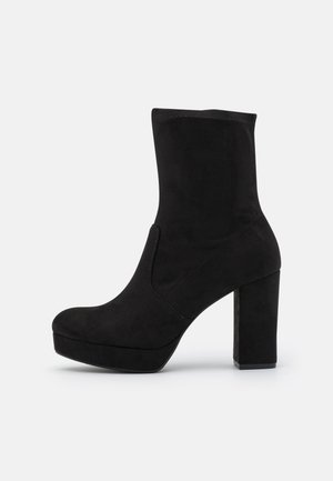 Bottines à talons hauts - black