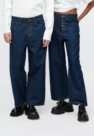 UNISEX - Túlméretezett farmernadrág - raw denim