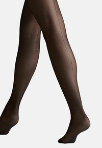 Collant opaco neri con una cucitura verticale e sottili accenti scintillanti lungo i lati, che mettono in risalto una texture e una vestibilità liscia.