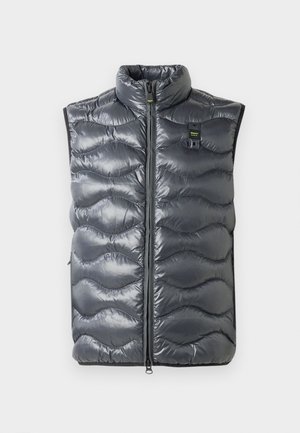 Gray puffer vest with a high collar, featuring a zip closure and wave-patterned texture. Includes a small logo near the zipper.