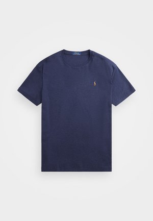 Granatowy t-shirt z krótkim rękawem i okrągłym dekoltem, z małym haftowanym logo Polo Ralph Lauren na lewej piersi.
