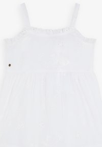 Weißes ärmelloses Kleid mit einem Rüschenausschnitt, bestickten Mustern und gerafftem Bund. Verfügt über verstellbare Träger und einen kleinen dekorativen Knopf.