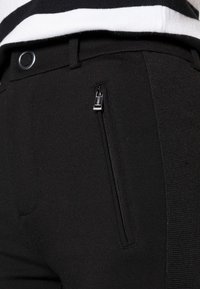 Guess GRETA SKINNY PANTS - Calças - jet black