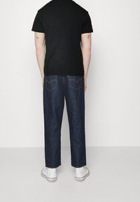 Calvin Klein Jeans Triko s potiskem - black