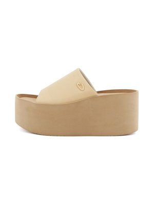 Beige platform slidesandaler med en glat finish, åben tå og buet overdel. Har et diskret logo prægning på siden.