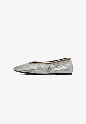 Silver leather ballet flat with a rounded toe, gathered ankle detail, and a flat sole. Smooth texture with a reflective finish.