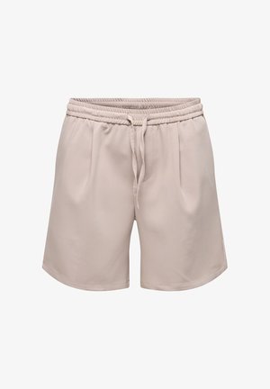 Short beige taille élastique avec cordon à l’avant et poches latérales, fabriqué en tissu lisse, présenté sur fond blanc.