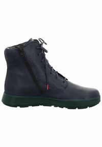 Navy leather ankle boots with front lace-up and side zipper closure; textured rubber sole in dark green; minimal design with no embellishments.