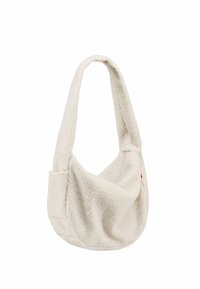 Borsa a tracolla in pile beige con una singola tracolla larga, caratterizzata da un design morbido e una tasca laterale. Materiale soffice e texturizzato.