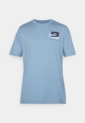 Light blue cotton t-shirt with short sleeves, featuring a squared logo design in dark blue and white on the left side of the chest.