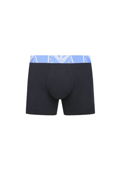 Black cotton boxer shorts with a blue elastic waistband featuring a logo, front pouch, and seam detailing.