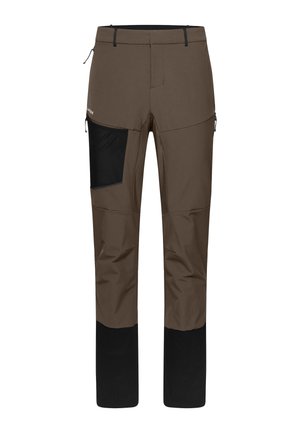 Brown technical outdoor pants with a black accent pocket, featuring a slim fit, durable material, and tapered legs. Zippered side pocket included.