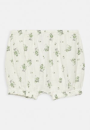 Calções de algodão leves em off-white com estampado floral verde, apresentando uma cintura elástica e aberturas nas pernas franzidas.